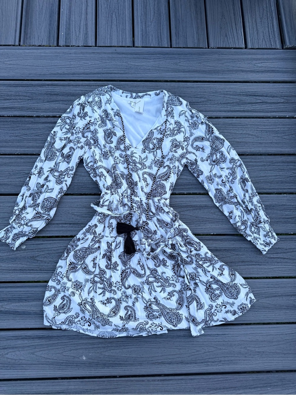 Francesca’s White Paisley Wrap Mini Dress with Black Tassel
